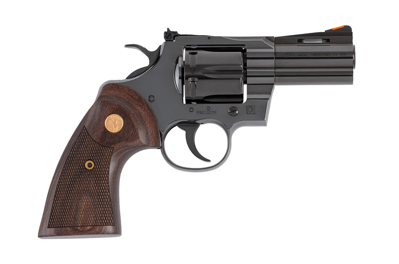 Colt Python .357 Magnum 3-inch blued revolver with walnut target grips and 6-round fluted cylinder
