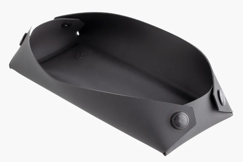 Magpul DAKA Field Tray Small in black folded into a tray with magnetic working surface
