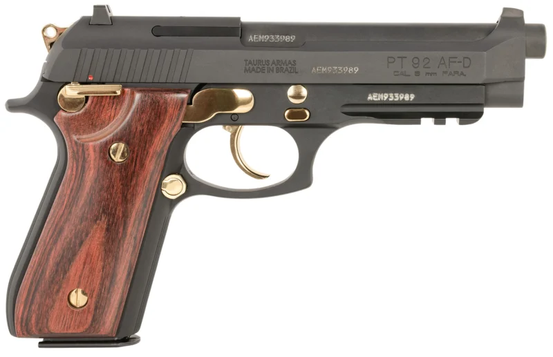 Taurus 92 9mm full-size pistol with 5-inch barrel and wood grips, matte black with gold accents