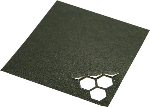 Hexmag black grip tape sheet with 46 hex shapes for Hexmag magazines