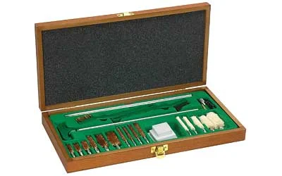 Remington Sportsman 27-piece multi-caliber cleaning kit in wooden presentation case with brushes and patches