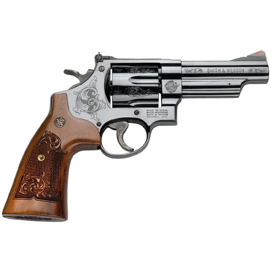 Smith & Wesson Model 29 4 inch blued machine engraved .44 Magnum revolver with wood grips