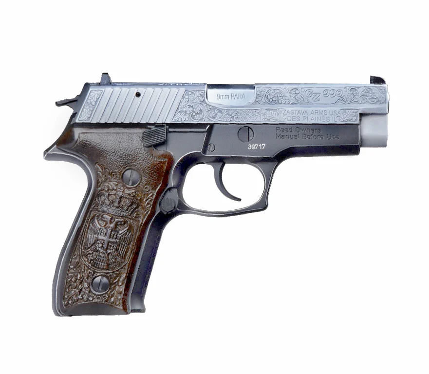 Zastava CZ999 hand-engraved 9mm pistol with 4.25 inch barrel and engraved walnut grips