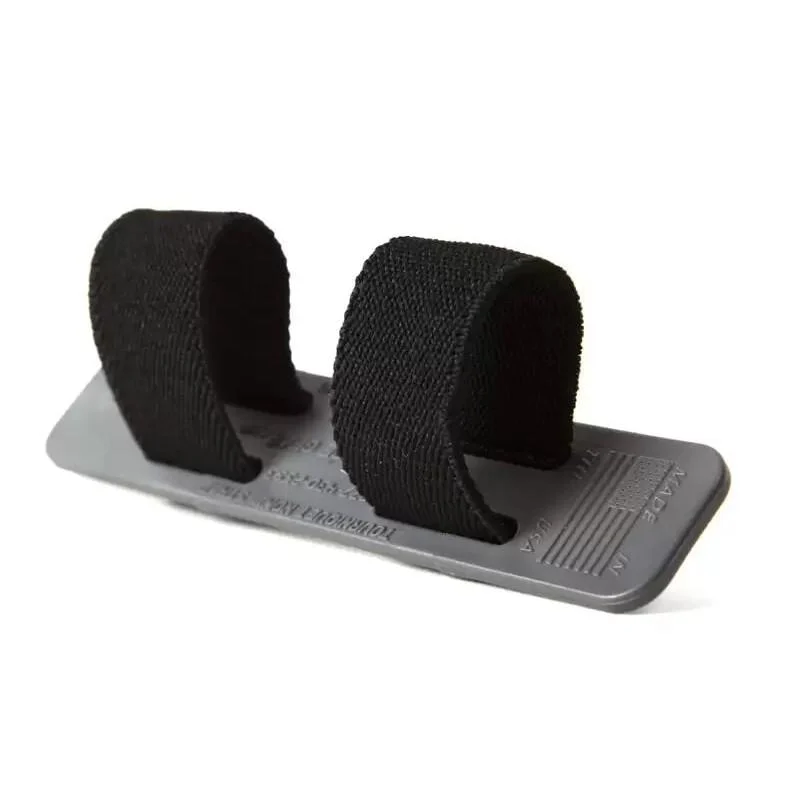 Blue Force Gear Tourniquet NOW! Strap tourniquet holder in black mounted on MOLLE with elastic retention loops